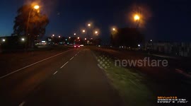 Red light car infront of copper