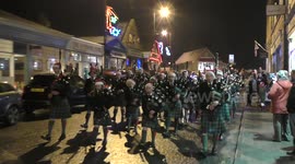 Ballater Winter Festival parade with pipe band & santa through highland village
