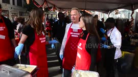 Shameless star Emmy Rossum hands out Thanksgiving dinner at the Los Angeles Mission in Los Angeles, Ca