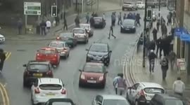 Football thugs caught on CCTV rioting 'like pack of animals'