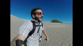 This is what boogie boarding down the Death Valley sand dunes looks like