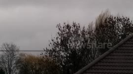 Emirates Airbus A380 approaches Manchester Airport in storm