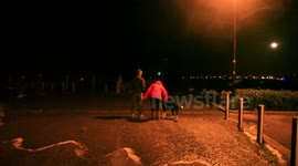 people risking life to watch waves has tide breaks sea defence mountbatten plymouth devon