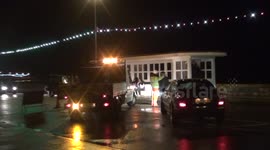 Part 1 of 3. Police, Coastguard and Highways Agency in action. Rough evening seas and flooded roads.