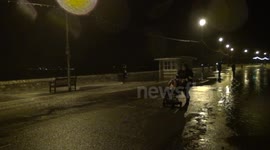 Part 3 of 3. People getting very wet. Rough evening seas and flooded roads.