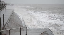 People get wet by waves in Ventnor on the isle of Wight