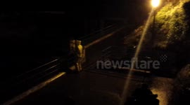 Man risking life wile family watch  plymouth storm
