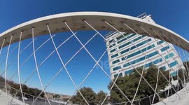 BMX biker rides over Ft. Worth 7th Street Bridge arches