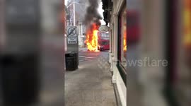 Double decker bus bursts into flames in the middle of a town centre