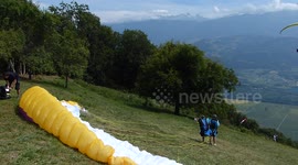 Paraglider taking flight. in Saint-Hilaire, Isère, France