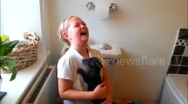 Girl, 10, reacts emotionally to Christmas puppy surprise