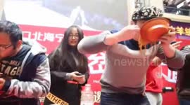 Woman finishes bowl in eight seconds in noodle eating competition