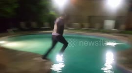 Man attempts to jump across pool at wedding, it goes wrong