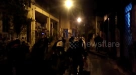 Students and Greek anarchists trow molotov cocktails to police during anniversary