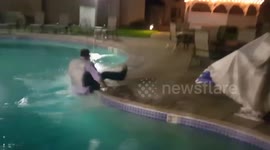 Newsflare Edit - Man attempts to jump across pool at wedding, it goes wrong