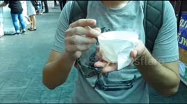Man eats banana frozen in liquid nitrogen