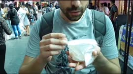Man eats banana frozen in liquid nitrogen