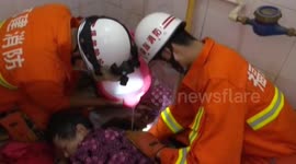 Firefighters rescue an elderly woman stuck arm in urinal