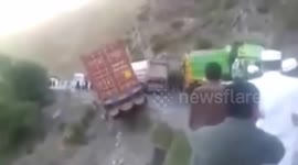 Driver keeps lorry from falling down mountain edge