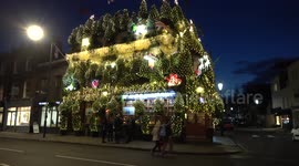 London pub installs 21,000 lights and 90 Christmas Trees and it looks awesome