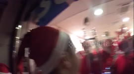 Santas overrun STA travel shop