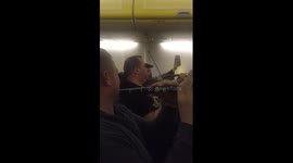 Musicians 'cheer up' air stewards with impromptu performance on flight