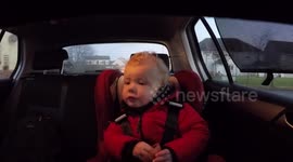 Boy, 2, head bangs along to rock music