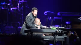 Stevie Wonder gets emotional as Lionel Richie sings We Are The World at his 20th Anual House Full of Toys Concert in Los Angeles, Ca