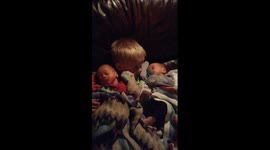 Cutest kid video: Brother holds twins for the first time and won't let go!