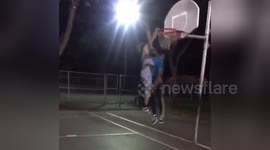 Newsflare Edit - CRAZY dunk on kid makes park go wild!