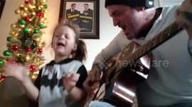 Father and daughter sing 'grunge' version of Christmas song