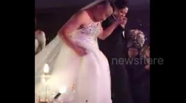 Groom wears dress and bride wears tuxedo at bizarre Chinese wedding