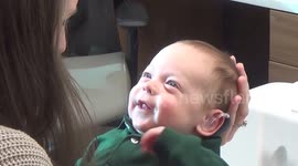 Baby hears his parents' voices for the first time