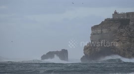 XXL wave surfing spectators get a drenching at Nazare
