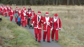 Santa Ramble through highland village of Braemar in Cairngorms Scotland