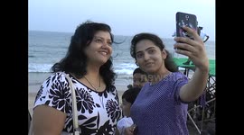 two young girls take sellpy in beach