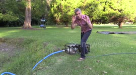 Innovative dad sets up slip 'n' slide during drought using oil instead of water