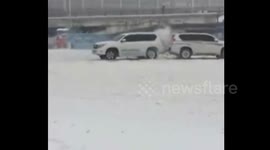 Two cars crash on snow-covered road