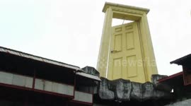 Giant golden door built on top of building in central China