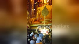 Newsflare Edit - Ceremony Buddha dress in Thailand