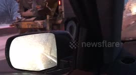 Newsflare Edit - Snow plough vehicle causes sparks to fly on road in Quebec, Canada