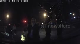 Scooter driver jumps onto car bonnet to smash the front windscreen