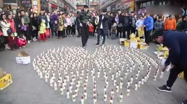 Man proposes to girlfriend by forming giant heart out of thousands of soy milk bottles