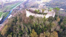 Aerial shot, medieval ruins on the hill, overcast weather, Europe, filmed with drone