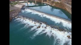 Wintery aerial shot of river in Tuscany