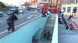 Parkour expert performs incredible flip stunt, ending up on road