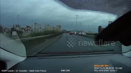 Motorcyclist Takes Life Into His Hands To Overtake