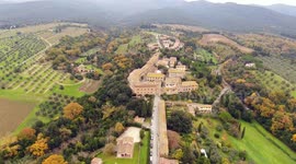 Aerial shot, a small ancient town situated in the middle of rural landscape