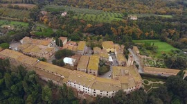 Aerial shot, a small ancient town situated in the middle of rural landscape