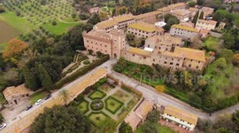 Aerial shot, a small ancient town situated in the middle of rural landscape